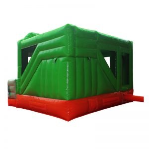 Rear view of a green and orange Dino themed inflatable.