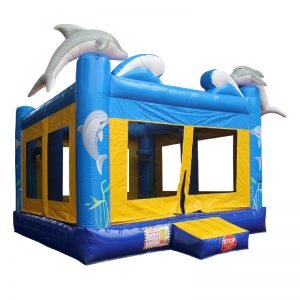 Blue and yellow Dolphin bouncy castle front view.
