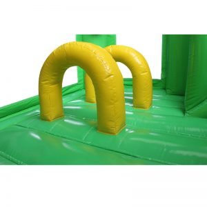 Green and yellow bouncy castle obstacles.