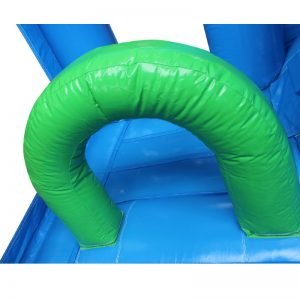 Green obstacle in a blue bouncy castle.